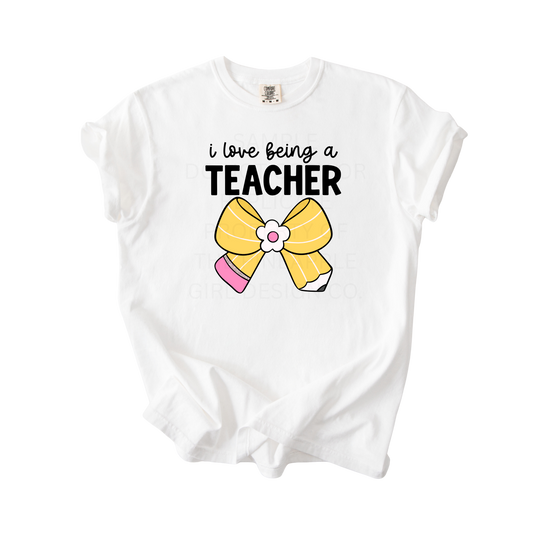 I Love Being A Teacher Bow Tee
